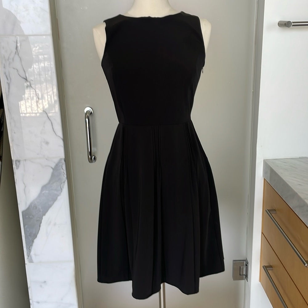 Calvin Klein size 4 black sleeveless dress.